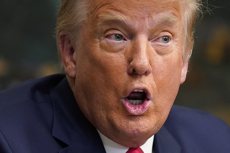 Photo by Patrick Semansky of The Associated Press / President Donald Trump speaks with reporters after participating in a video teleconference call with members of the military on Thursday, Nov. 26, 2020, at the White House in Washington.