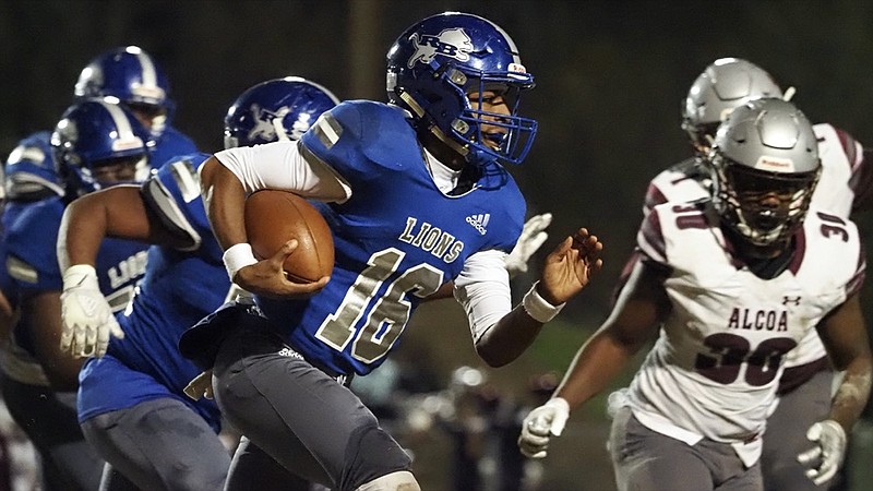 Staff photo by C.B. Schmelter / Red Bank's Joseph Blackmon (16) carries the ball against Alcoa during the Class 3A semifinals at Red Bank Community Stadiumon Friday, Nov. 27, 2020 in Chattanooga, Tenn.
