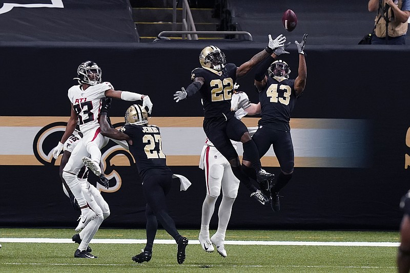 AP photo by Butch Dill / New Orleans Saints free safety Marcus Williams (43) intercepts a pass by Atlanta Falcons quarterback Matt Ryan in the first half of last Sunday's game in New Orleans.