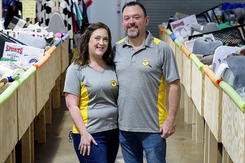 Staff photo by C.B. Schmelter / Jerry, right, and Erica Evans pose at their business, Finders Keepers Treasure Seekers, on Friday, Nov. 6, 2020 in Chattanooga, Tenn.