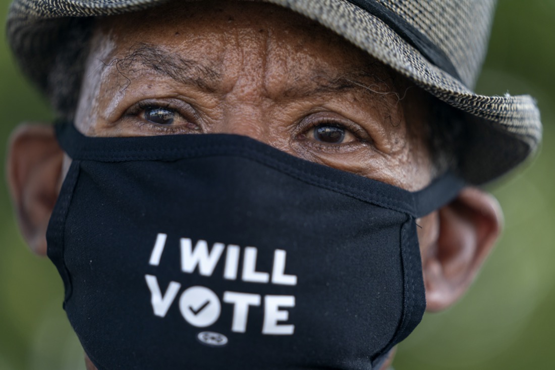 Walter Carter, 74, of Woodbridge, Va., who attended the original March on Washington, attends 2020's March on Washington at the Lincoln Memorial on Aug. 28, 2020, the 57th anniversary of the Rev. Martin Luther King Jr.'s