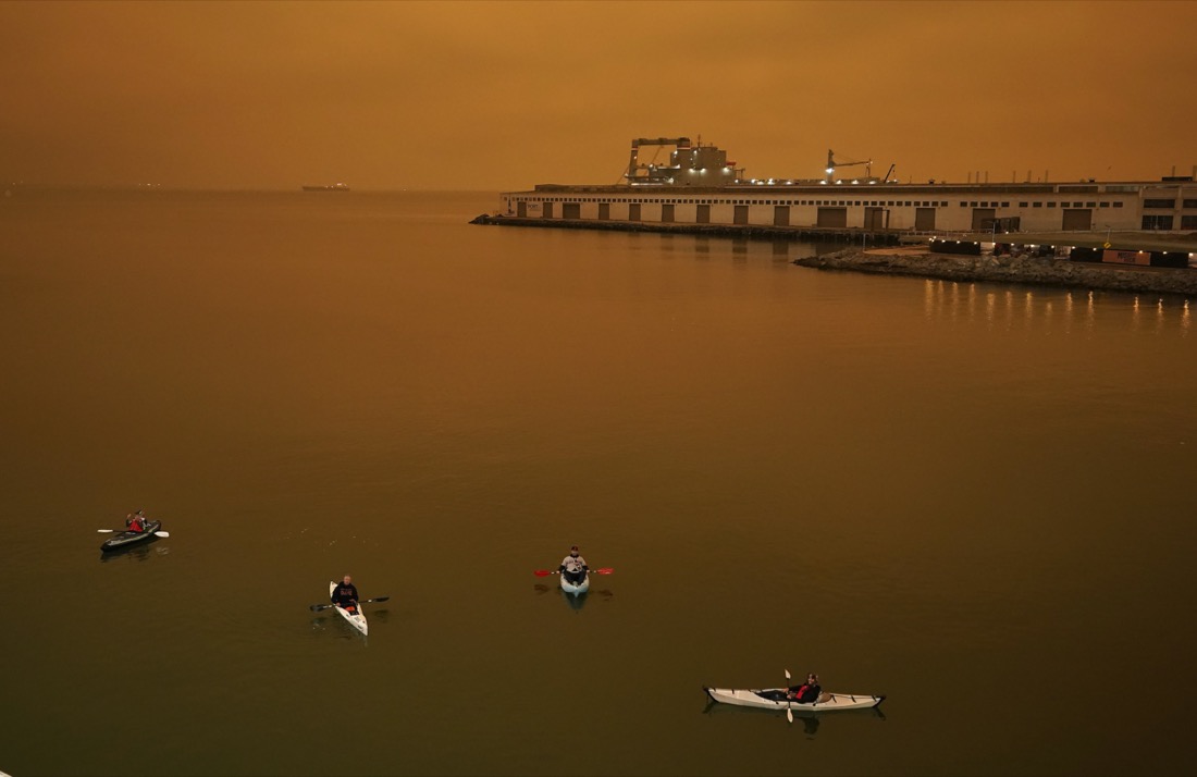 People in kayaks paddle in McCovey Cove outside Oracle Park in San Francisco during a baseball game between the San Francisco Giants and the Seattle Mariners on Sept. 9, 2020. (AP Photo/Tony Avelar)