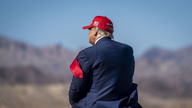 Photo by Doug Mills of The New York Times / President Donald Trump's tie is blown by the wind during a campaign rally at the Laughlin/Bullhead International Airport in Bullhead City, Arizona, on Oct. 28, 2020.