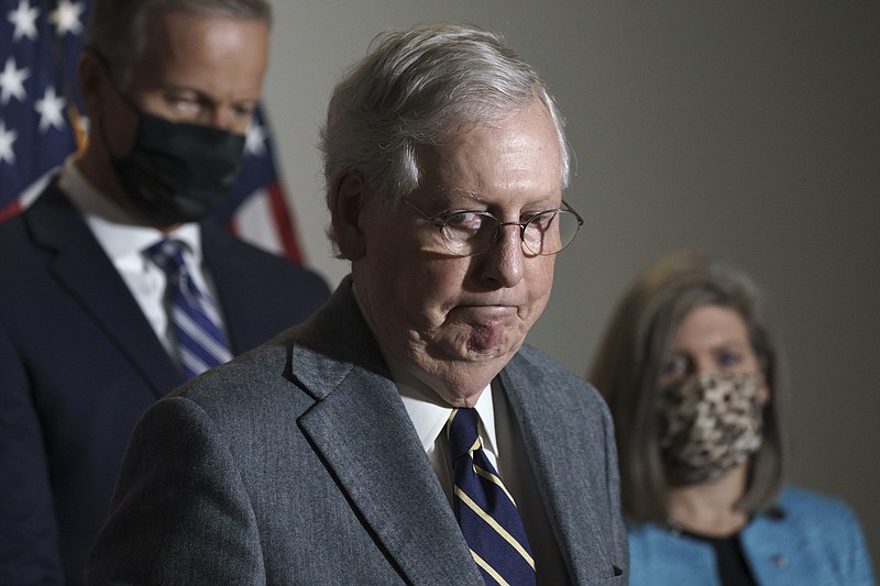 Photo by J. Scott Applewhite of The Associated Press/ Senate Majority Leader Mitch McConnell, R-Kentucky, arrives to talk to reporters after a Republican Conference luncheon on Capitol Hill in Washington on Tuesday, Nov. 17, 2020.