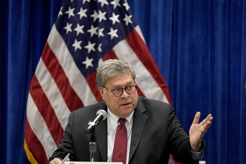 FILE - In this Oct. 15, 2020, file photo U.S. Attorney General William Barr speaks during a roundtable discussion on Operation Legend in St. Louis. Even before Barr issued a memo that authorized federal prosecutors across the country to investigate "substantial allegations" of voting irregularities if they exist, the Justice Department had already begun looking into two specific allegations. (AP Photo/Jeff Roberson, File)