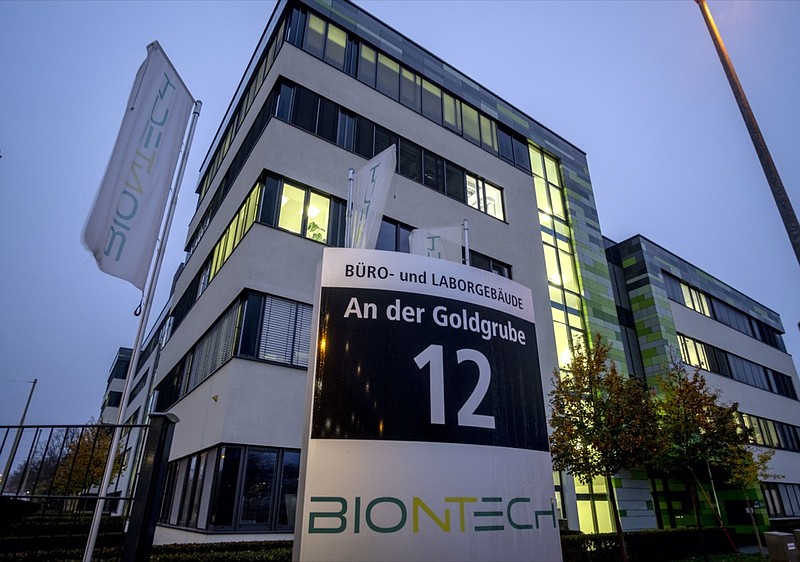 File -- In this Tuesday, Nov.10, 2020 file photo windows are illuminated at the headquarters of the German biotechnology company BioNTech in Mainz, Germany. Pfizer and BioNTech say they've won permission Wednesday, Dec. 2, 2020, for emergency use of their COVID-19 vaccine in Britain, the world's first coronavirus shot that's backed by rigorous science -- and a major step toward eventually ending the pandemic.(AP Photo/Michael Probst, file)