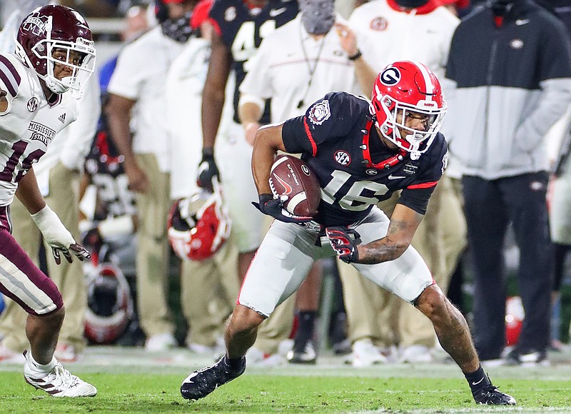 Georgia photo by Chamberlain Smith / Georgia senior receiver Demetris Robertson looks for running room during the 31-24 win over Mississippi State on Nov. 21.