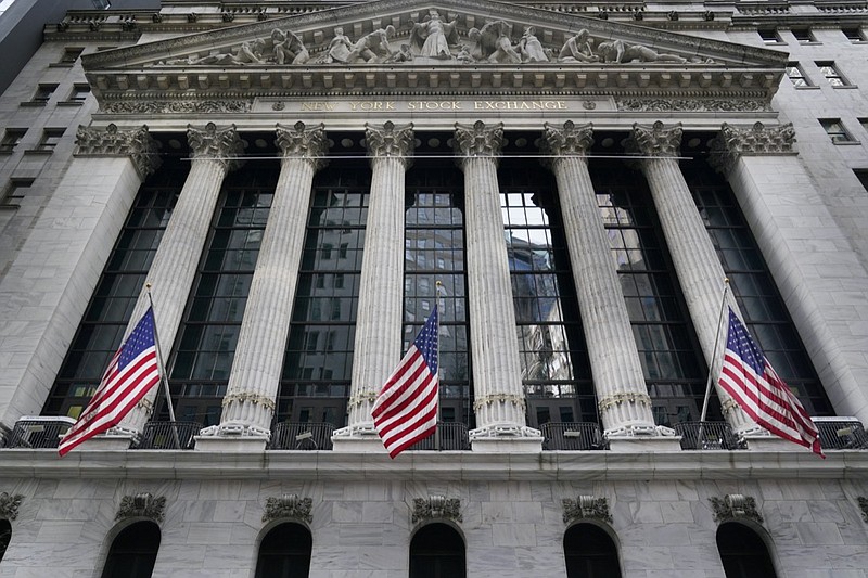 The New York Stock Exchange is seen in New York, Monday, Nov. 23, 2020. U.S. stocks are hovering close to their record levels Thursday, Dec. 3, as Wall Street takes a pause following its rocket ride higher on optimism about a coming COVID-19 vaccine. (AP Photo/Seth Wenig)