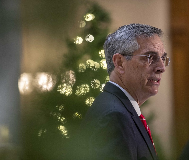 Georgia Secretary of State Brad Raffensperger makes remarks during a press conference at the Georgia State Capitol building in Atlanta, Wednesday, Dec. 2, 2020. (Alyssa Pointer/Atlanta Journal-Constitution via AP)