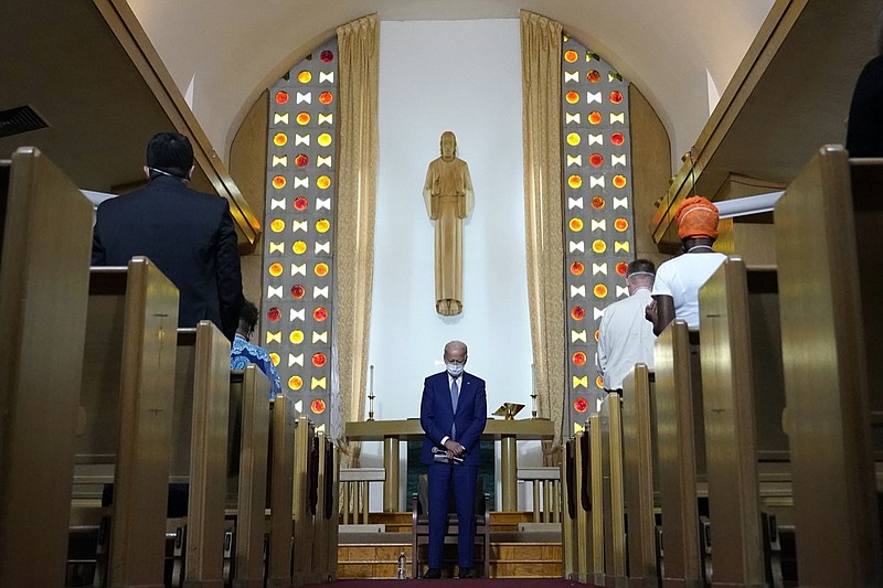 FILE - In this Thursday, Sept. 3, 2020 file photo, Democratic presidential candidate former Vice President Joe Biden bows his head in prayer at Grace Lutheran Church in Kenosha, Wis. Conservative evangelical Christians have proven some of Donald Trump's staunchest allies during his presidency. As his administration draws to a close, some of those backers are approaching President-elect Biden with skepticism, but not antagonism. (AP Photo/Carolyn Kaster)