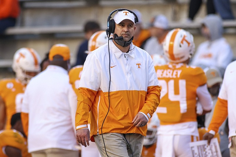 Tennessee coach Jeremy Pruitt watches during the first half of the team's NCAA college football game against Florida on Saturday, Dec. 5, 2020, in Knoxville, Tenn. (Randy Sartin/Knoxville News Sentinel via AP, Pool)