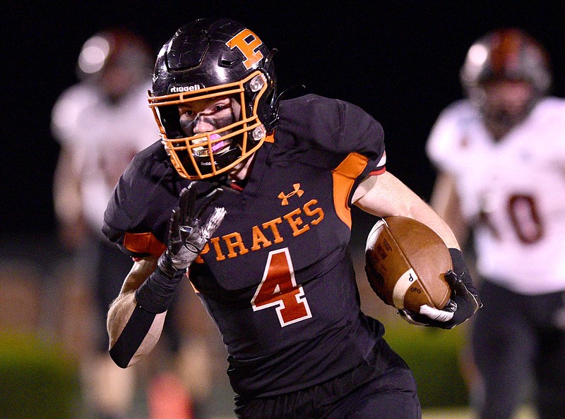 Staff Photo by Robin Rudd /  Hunter Frame (4) heads to the end-zone for another Pirate touchdown.  The South Pittsburg Pirates hosted the Coalfield Yellow Jackets in a TSSAA semifinal playoff game on November 27, 2020.  