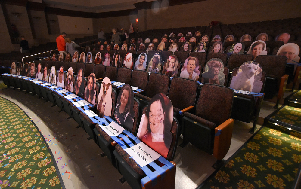 Staff Photo by Matt Hamilton / Cut out pictures of friends, family, pets and celebrities fill the empty seats during a rehearsal for "The Nutcracker 2020" by The Dance Theatre of Dalton at the Colonnade Center in Ringgold on Wednesday, Dec. 9, 2020. In previous years, the performance was at Dalton High School, but COVID-19 precautions have moved the performance to the Colonnade Center. Tickets are only available to family members but the performances can be viewed at http://daltontoday.com for no charge.