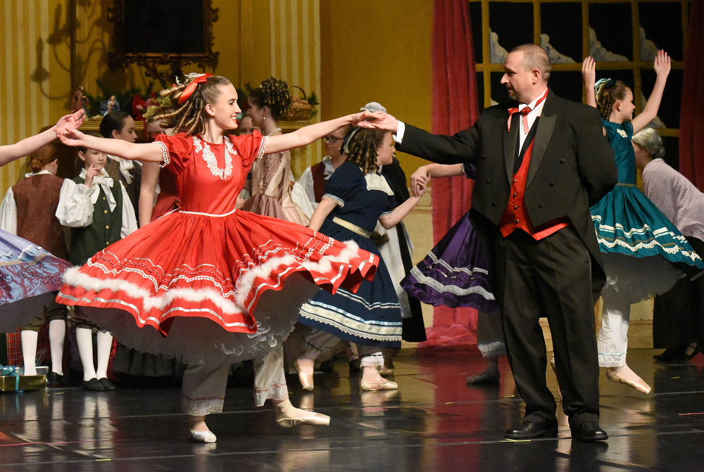 Staff Photo by Matt Hamilton / Claire Miller, left, plays Clara as she dances with Claudio Leyssens, playing Dr. Stahlbaum ,during a rehearsal for "The Nutcracker 2020" by The Dance Theatre of Dalton at the Colonnade Center in Ringgold on Wednesday, Dec. 9, 2020. In previous years, the performance was at Dalton High School, but COVID-19 precautions have moved the performance to the Colonnade Center. Tickets are only available to family members but the performances can be viewed at http://daltontoday.com for no charge.