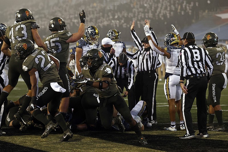AP photo by Adam Hunger / Army stopped Navy's offense at the goal line on this play during the second half of Saturday's rivalry matchup in West Point, N.Y.