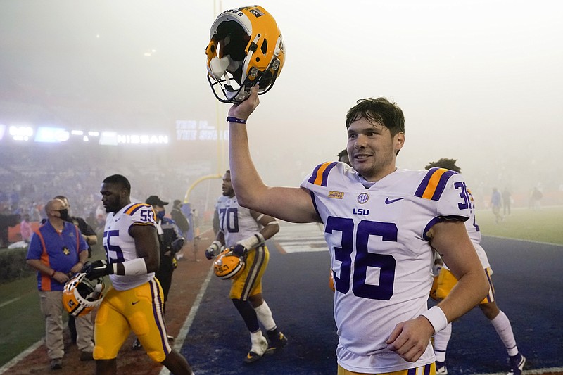 AP photo by John Raoux / LSU's Cade York celebrates as he comes off the field after kicking a 57-yard field goal against Florida in the final minute of Saturday night's SEC matchup in Gainesville. York's Tigers upset the sixth-ranked Gators 37-34.