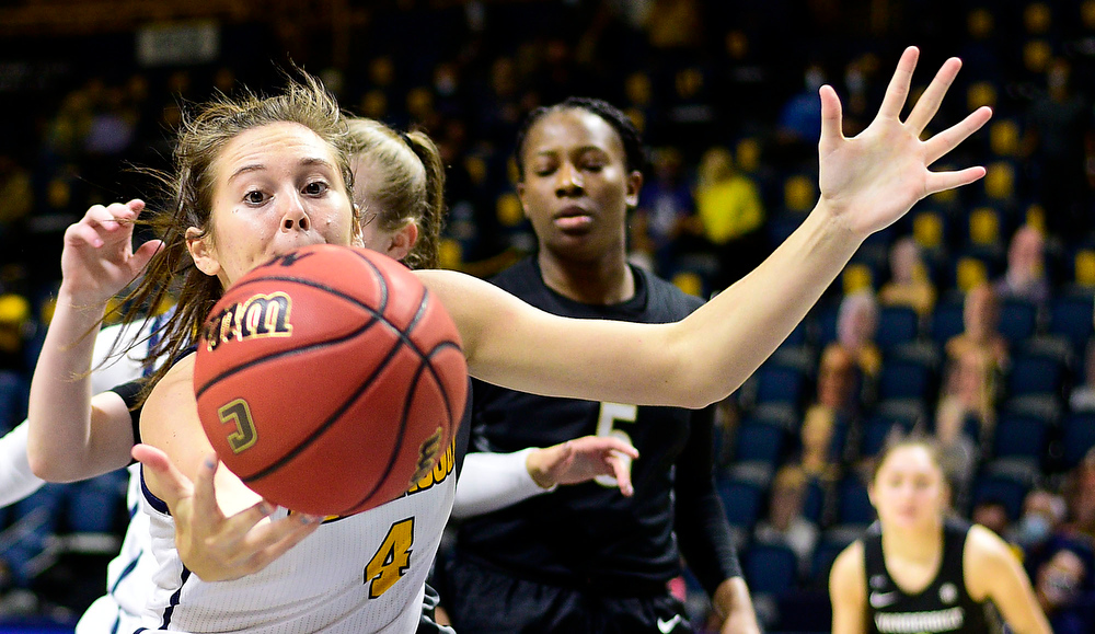 Staff photo by Robin Rudd / UTC freshman Anna Walker, a former Bradley Central standout, goes after an offensive rebound during Sunday's game against Vanderbilt at McKenzie Arena. The Mocs led for much of the game but lost 80-78 to fall to 1-3.