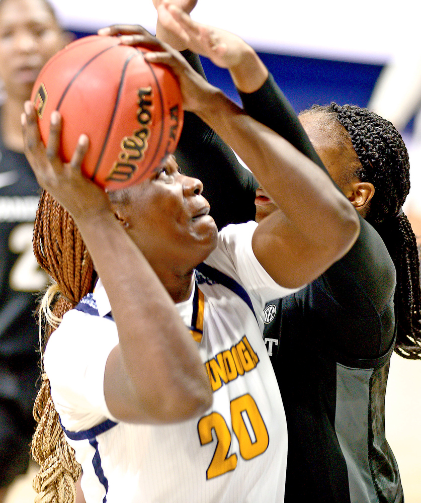 Staff Photo by Robin Rudd / UTC's Ruona Owusiaba (20) shoots in traffic. The University of Tennessee at Chattanooga lost a close home game to Vanderbilt, 80-78 in NCAA women's basketball at the McKenzie Arena on December 13, 2020. .