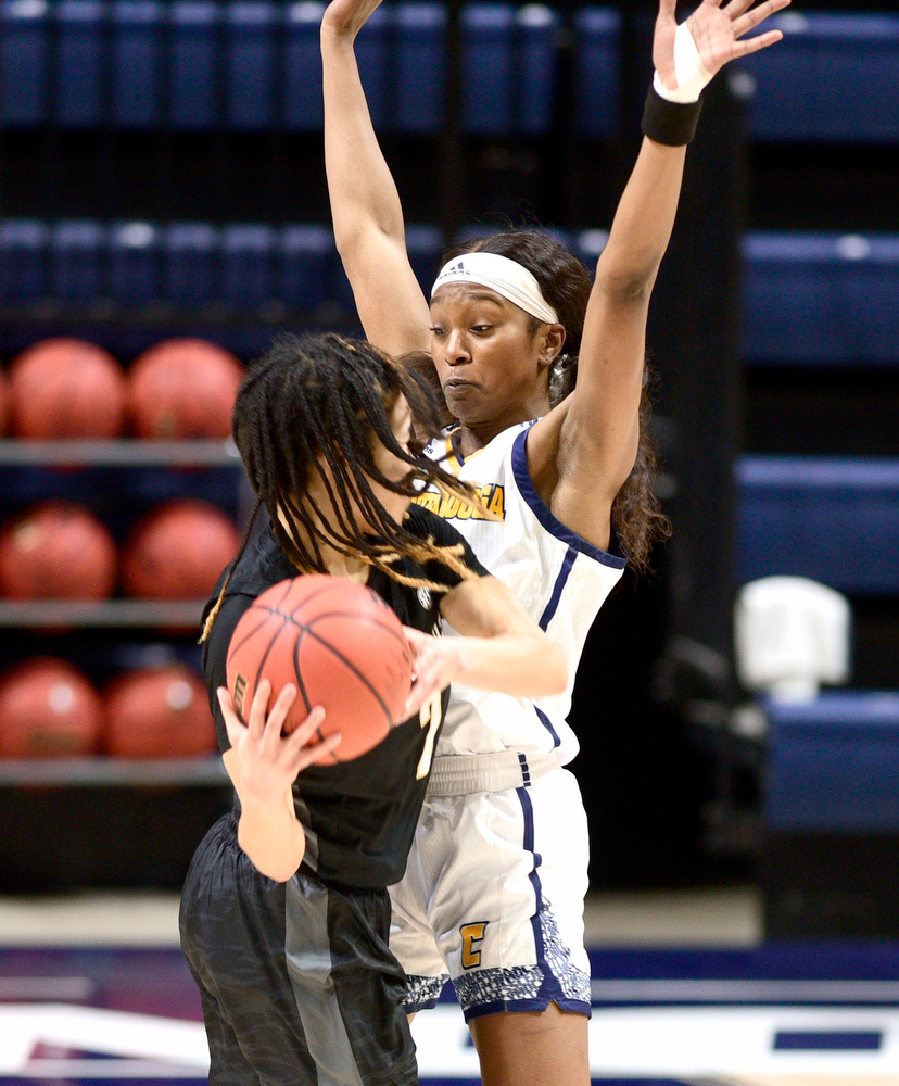 Staff Photo by Robin Rudd / UTC's Eboni Williams (3) plays close defense against Vanderbilt's Chelsie Hall (2). The University of Tennessee at Chattanooga lost a close home game to Vanderbilt, 80-78 in NCAA women's basketball at the McKenzie Arena on December 13, 2020. .