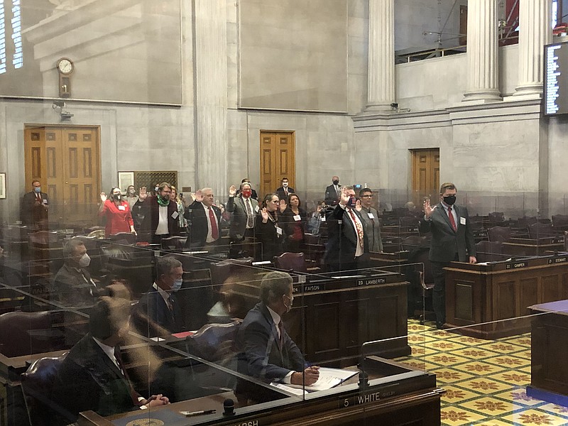 Tennessee's 11 Republican Electoral College members take oath before casting state's ballots on behalf of President Donald Trump. (Andy Sher/Times Free Press)