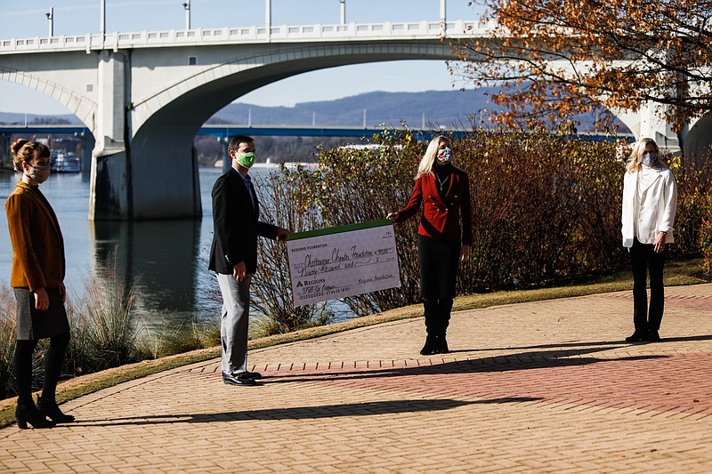 Staff photo by Troy Stolt / Molly Blankenship, executive director of Chattanooga 2.0, Michael Mathis, market president of Regions Bank in Chattanooga, Christy Gillenwater, president of the Chattanooga Chamber, and Rebecca Ashford, president of Chattanooga State, stand for a photograph during a photo shoot to announce the Regions Foundation's $90,000 donation to the Skill up initiative, which will provide more than 45 people with six weeks of training in advanced manufacturing, customer service, and information technology on Tuesday, Dec. 15, 2020 in Chattanooga, Tenn.