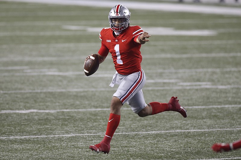 AP photo by Jay LaPrete / Ohio State quarterback Justin Fields.