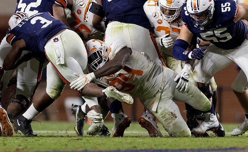 Tennessee Athletics photo by Andrew Ferguson / Tennessee senior defensive end Matthew Butler makes a stop during last month's 30-17 loss at Auburn.