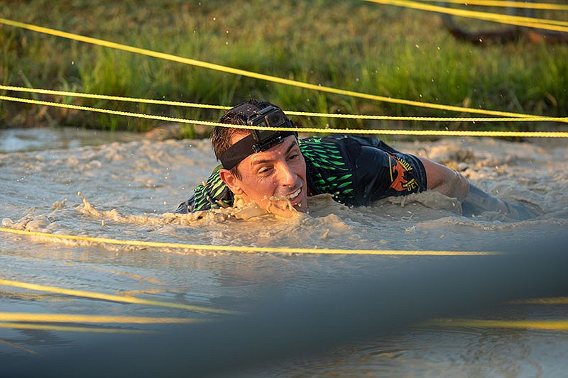 Participants compete in the 2020 CHI Memorial Scenic City Mud Run. / Photo by Dan Henry/ DanHenryPhotography.com