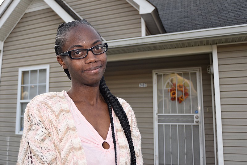 Staff Photo by Matt Hamilton / Jasmine Fuller at her new rental home in November. Neediest Cases helped her and her three children after her fiance was killed in Easter storms.