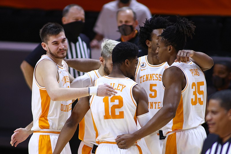 USA Today Sports photo by Randy Sartin / From left, Tennessee's John Fulkerson, Santiago Vescovi, Victor Bailey Jr., Josiah-Jordan James and Yves Pons huddle before Wednesday night's home game against USC Upstate tips off.