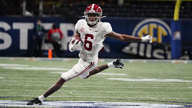 AP photo by Brynn Anderson / Alabama wide receiver DeVonta Smith (6) has been joined by teammate Mac Jones, the Crimson Tide's quarterback, as Heisman Trophy finalists announced Thursday evening. Clemson quarterback Trevor Lawrence and Florida quarterback Kyle Trask are the other two players in the running for the award, with the winner to be announced Jan. 5.