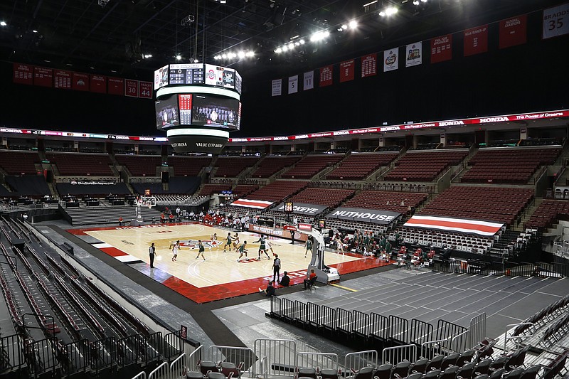 AP photo by Jay LaPrete / Cleveland State University plays at Ohio State in men's basketball on Dec. 13 in front of an empty arena in Columbus.