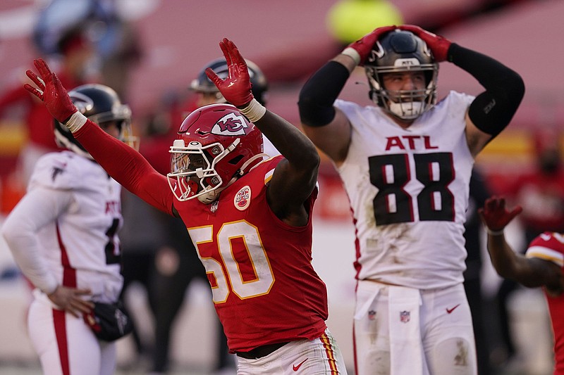 AP photo by Charlie Riedel / Kansas City Chiefs linebacker Willie Gay (50) celebrates next to the Atlanta Falcons' Luke Stocker after Younghoe Koo missed a 39-yard field-goal attempt in the final seconds of Sunday's game in Kansas City, Mo. The Chiefs won 17-14 to improve to 14-1 and clinch a first-round bye in the playoffs, while Atlanta dropped to 4-11.