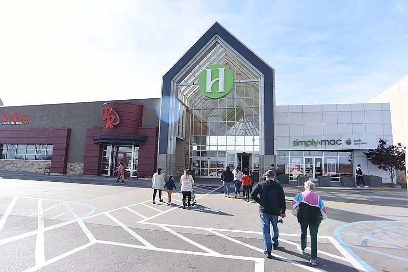 Staff File Photo by Matt Hamilton / Shoppers enter Hamilton Place mall prior to Thanksgiving earlier this year.