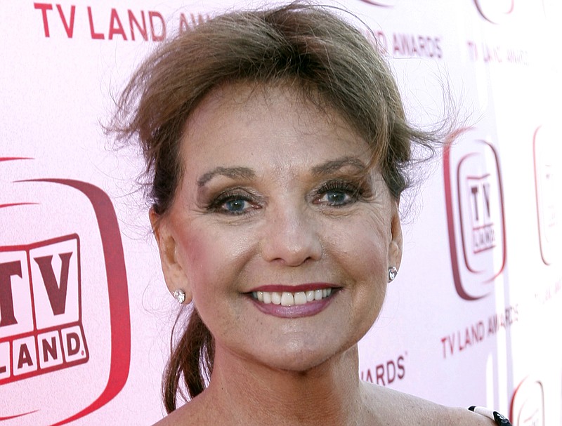 In this June 8, 2008 file photo, actress Dawn Wells arrives at the TV Land Awards in Santa Monica, Calif. Wells, who played the wholesome Mary Ann among a misfit band of shipwrecked castaways on the 1960s sitcom "Gilligan's Island, died Wednesday, Dec. 30, 2020, of causes related to COVID-19, her publicist said.(AP Photo/Matt Sayles)