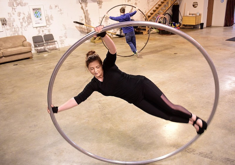 Staff Photo by Robin Rudd / Jessica Ledbetter exercises on the Cyr Wheel. The Cyr Wheel is a new form of exercise at Chattanooga Aerials. The class led by Daniel Buniak was photographed on Dec. 13, 2020. 