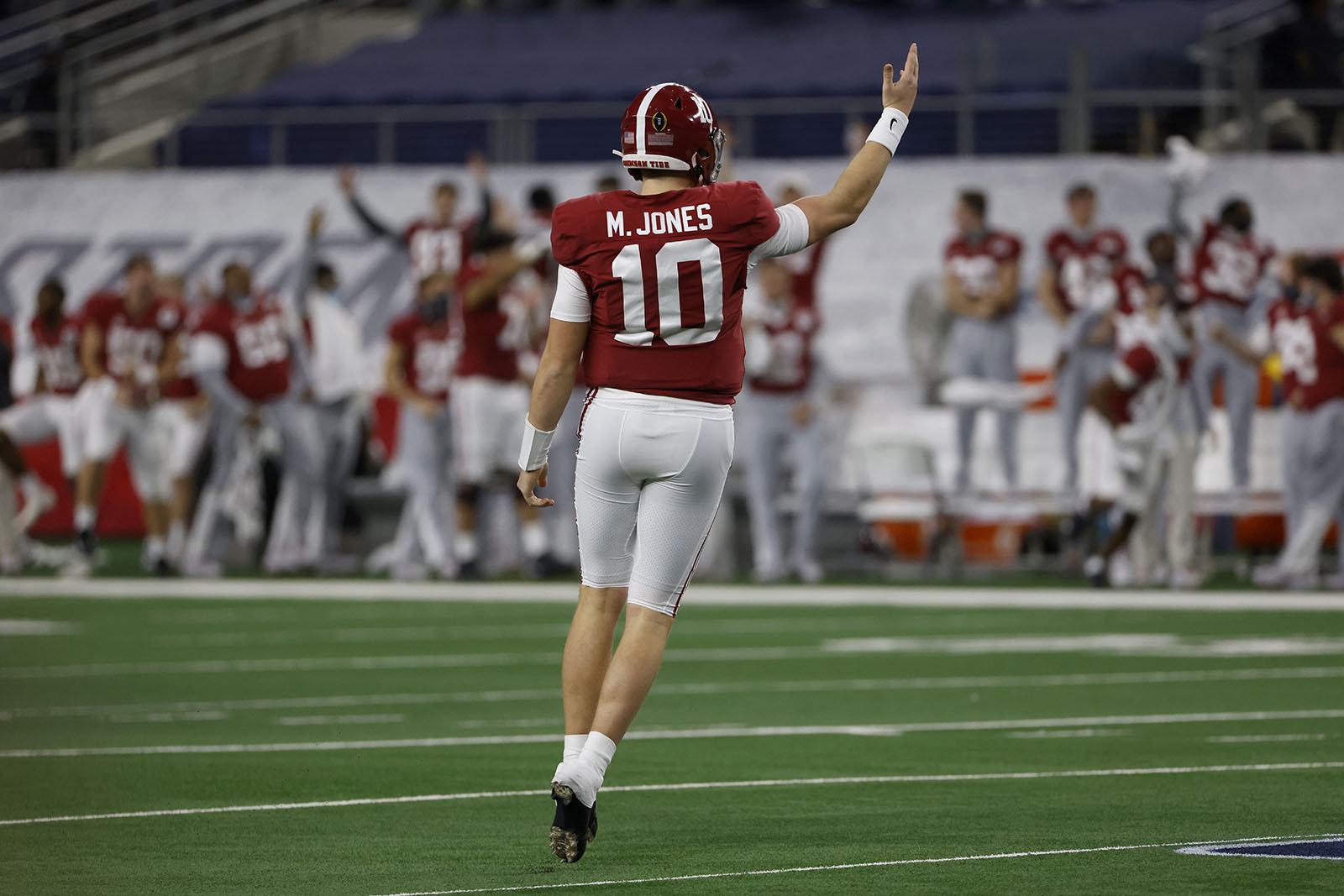 Alabama quarterback Mac Jones (10) celebrates throwing a touchdown pass to tight end Jahleel Billingsley (19) in the first half of the Rose Bowl NCAA college football game against Notre Dame in Arlington, Texas, Friday, Jan. 1, 2021. (AP Photo/Ron Jenkins)