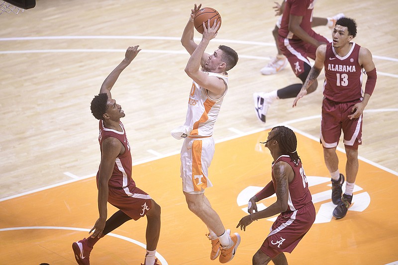AP photo by Caitie McMekin / Tennessee forward John Fulkerson shoots during Saturday's home game against Alabama.