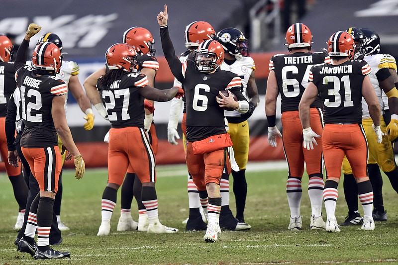 AP photo by David Richard / Cleveland Browns quarterback Baker Mayfield (6) celebrates after his team beat the Pittsburgh Steelers on Sunday to clinch a postseason berth.