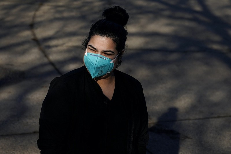 Lily Guido poses for photos in Sebastopol, Calif., Monday, Dec. 21, 2020. Taxpayers in families that include immigrants in the country illegally are celebrating the December federal relief bill after being excluded from the April relief stimulus. (AP Photo/Jeff Chiu)