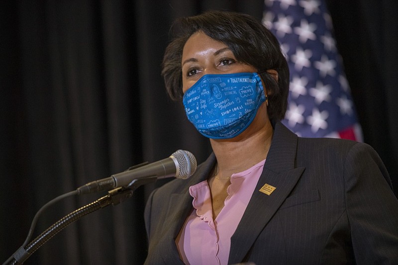 FILE - In this Dec. 17, 2020 file photo, District of Columbia Mayor Muriel Bowser speaks during a news conference in Washington. Homicides in Detroit, New York, Philadelphia and other cities have topped 2019 numbers as violence surged while much of the U.S. struggled during the coronavirus pandemic. "We're all sick of the heinous crimes in our city," said Bowser. (Shawn Thew/Pool via AP, File)