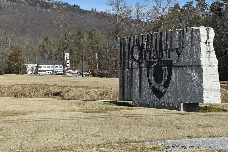 Staff file photo / A sign sits at the entrance to property holding a clubhouse and a former golf course known as the Quarry in this file photo.