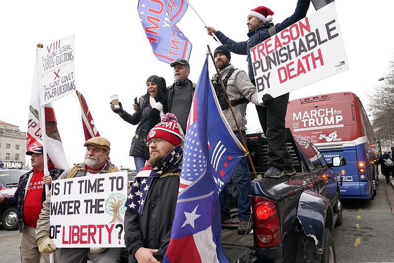 People attend a rally at Freedom Plaza Tuesday, Jan. 5, 2021, in Washington, in support of President Donald Trump. (AP Photo/Jacquelyn Martin)