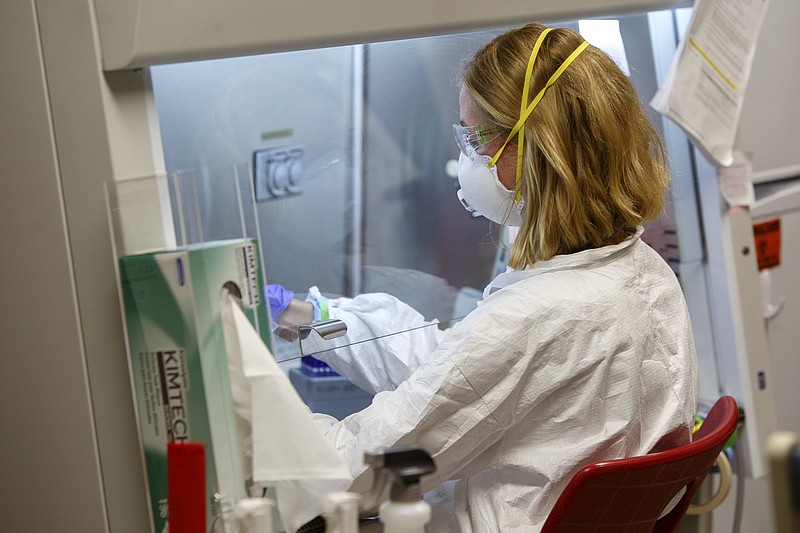 Staff photo by C.B. Schmelter / Dr. Elizabeth Forrester works at the Baylor Esoteric and Molecular Laboratory in the Weeks Science Building on the campus of Baylor School on Friday, July 17, 2020 in Chattanooga, Tenn.