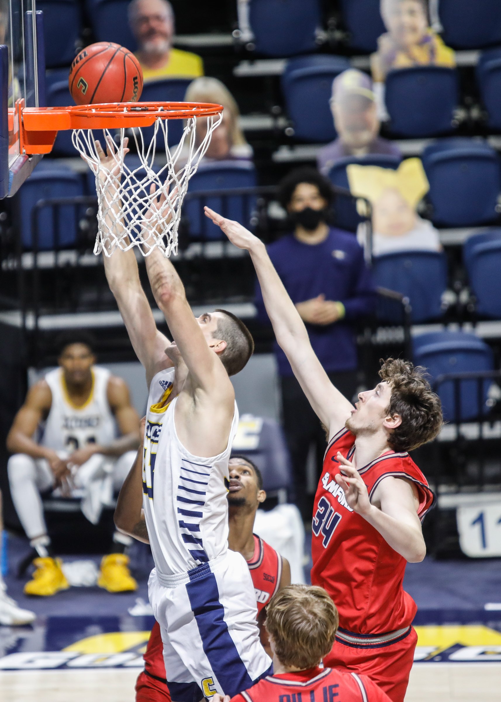 Staff photo by Troy Stolt / Chattanooga Mocs forward Stefan Kenic (33) lays the ball up during the UTC home basketball game against Samford at Mckenzie Arena on Wednesday, Jan. 6, 2021 in Chattanooga, Tenn.