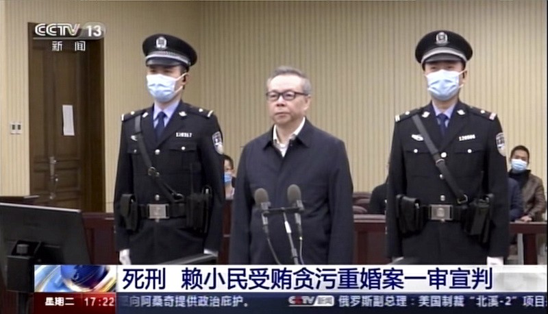 In this image taken from Jan. 5, 2021, video footage run by China's CCTV via AP Video, Lai Xiaomin, the former head of the state-owned China Huarong Asset Management Co.Ltd., attends court at the Second Intermediate People's Court of Tianjin in China. Lai has been sentenced to death for bribe taking in one of the harshest punishments for economic crimes in recent years. (CCTV via AP Video)