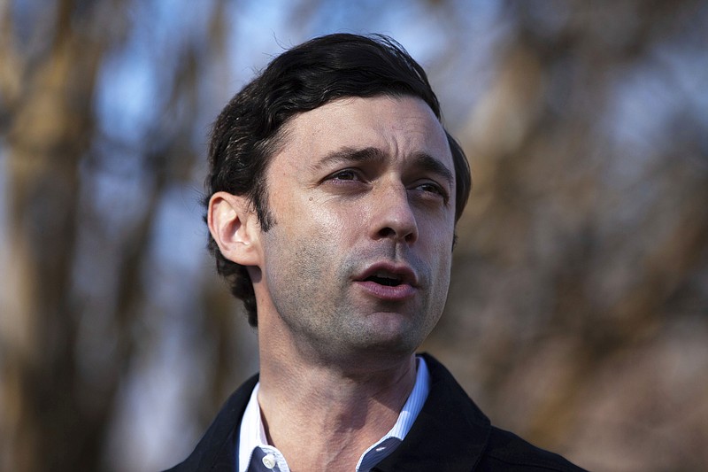 Democratic U.S. Senate challenger Jon Ossoff speaks to the media at Dunbar Neighborhood Center during Georgia's Senate runoff elections, Tuesday, Jan. 5, 2021, in Atlanta, Ga. (AP Photo/Branden Camp)