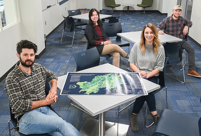 University of Tennessee at Chattanooga faculty and students have produced a map of areas needing environmental protection. Clockwise from left are Director of Geographic Informations Systems Charlie Mix, Nyssa Hunt, Will Stuart and Shannon Tattitch. / Photo contributed by the University of Tennessee at Chattanooga.