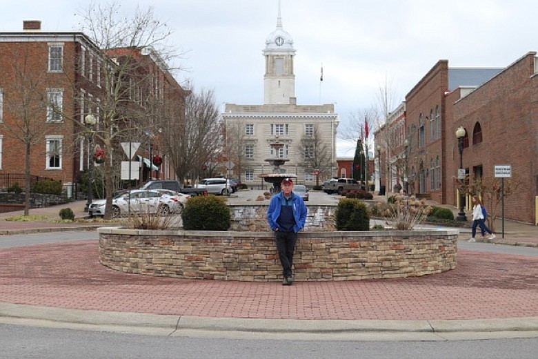 Times Free Press columnist Mark Kennedy poses near the town square in his hometown, Columbia, Tenn. / Contributed photo by Keeling Kennedy