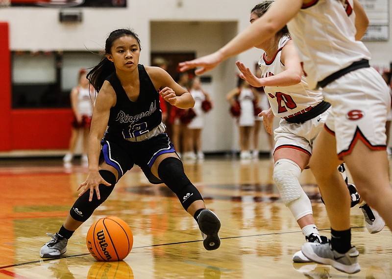 Staff photo by Troy Stolt / Ringgold point guard Rachel Lopez (12) dribbles the ball during the girls basketball game between Sonoraville and Ringgold high schools on Friday, Jan. 8, 2021 in Calhoun, Georgia.